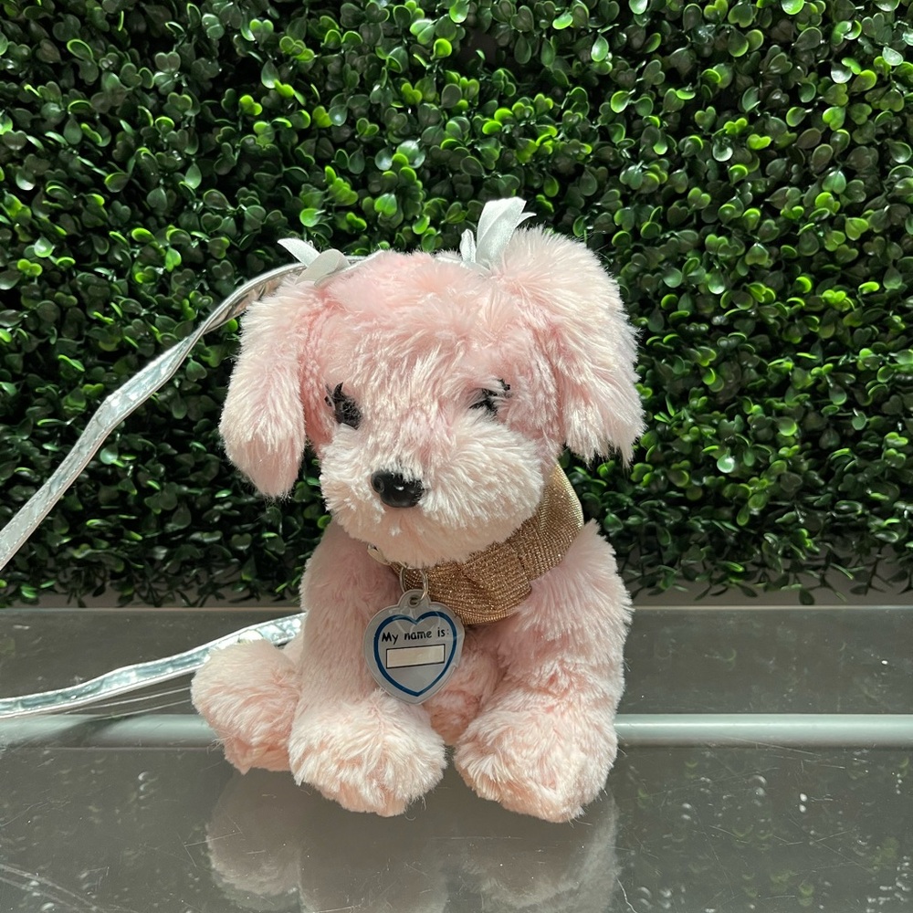 Poochie & Co. plush pink dog